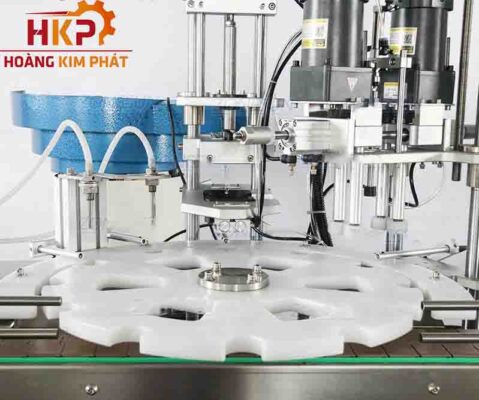 Máy siết nắp mâm xoay tự động.