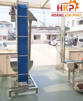 Băng tải cấp nắp tự động.