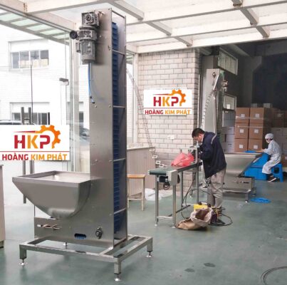 Băng tải cấp nắp tự động