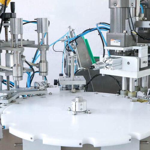 Máy siết nắp mâm xoay tự động.